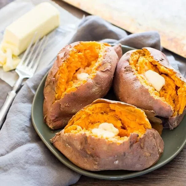 Microwaved sweet potatoes with butter