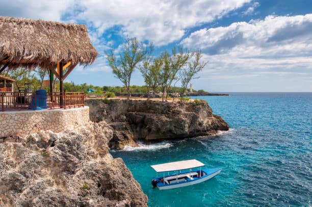 travel guide, Falmouth, Jamaica sugarcane farming town, best-preserved Georgian towns in the Caribbean, birthplace of Trelawny, governor of Jamaica, Albert George Market, Great Hall estates, Greenwood House, Good Hope Great House, Luminous Lagoon, Port Antonio, Banana Capital of the World, Blue Lagoon, Rio Grande, Frenchman's Cove, Fort George, DeMontevin Lodge, Navy Island, Folly Mansion's ruins, Titchfield, Errol Flynn, was washed ashore by a hurricane, Nine Mile Bob lives, Bob Marley Mausoleum compound, Rastafaria, birthplace of Bob Marley, Cedella Booker, Treasure Beach, fishing villages, Billy's Bay, Frenchman's Bay, Calabash Bay and Great bay, Kingston, Earthquake destroyed port Royal, Fort Charles, Devon House, Bob Marley Museum, Hollywell National Park, National Gallery of Jamaica, Hope Botanical Garden, Rockfort Mineral Baths, Blue Mountains, coffee plantations, Taino slaves and Maroons, Ocho Rios, Garden Parish, Dunn's River Falls, Dolphin Cove, White or Black rivers, Margaritaville, Bond films, Live and Let Die, Dr No, Ian Fleming, Goldeneye, Montego Bay, Doctor's Cave Beach, Walter Fletcher Beach, Montego Bay Marine Park, Green Grotto Caves- Bond's Live and Let Die, Cinnamon Hill Golf Club, Negril, beaches in the Caribbean, Bloody Bay to Long Bay in western Jamaica, Negril Cliffs, Blue Hole Mineral Springs, sunset catamaran cruise
