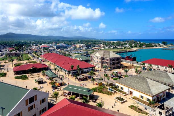 Falmouth, Jamaica sugarcane farming town, best-preserved Georgian towns in the Caribbean, birthplace of Trelawny, governor of Jamaica, Albert George Market, Great Hall estates, Greenwood House, Good Hope Great House, Luminous Lagoon, Port Antonio, Banana Capital of the World, Blue Lagoon, Rio Grande, Frenchman's Cove, Fort George, DeMontevin Lodge, Navy Island, Folly Mansion's ruins, Titchfield, Errol Flynn, was washed ashore by a hurricane, Nine Mile Bob lives, Bob Marley Mausoleum compound, Rastafaria, birthplace of Bob Marley, Cedella Booker, Treasure Beach, fishing villages, Billy's Bay, Frenchman's Bay, Calabash Bay and Great bay, Kingston, Earthquake destroyed port Royal, Fort Charles, Devon House, Bob Marley Museum, Hollywell National Park, National Gallery of Jamaica, Hope Botanical Garden, Rockfort Mineral Baths, Blue Mountains, coffee plantations, Taino slaves and Maroons, Ocho Rios, Garden Parish, Dunn's River Falls, Dolphin Cove, White or Black rivers, Margaritaville, Bond films, Live and Let Die, Dr No, Ian Fleming, Goldeneye, Montego Bay, Doctor's Cave Beach, Walter Fletcher Beach, Montego Bay Marine Park, Green Grotto Caves- Bond's Live and Let Die, Cinnamon Hill Golf Club, Negril, beaches in the Caribbean, Bloody Bay to Long Bay in western Jamaica, Negril Cliffs, Blue Hole Mineral Springs, sunset catamaran cruise