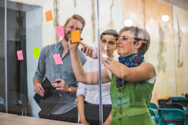Young creative business people meeting at office STRATEGY