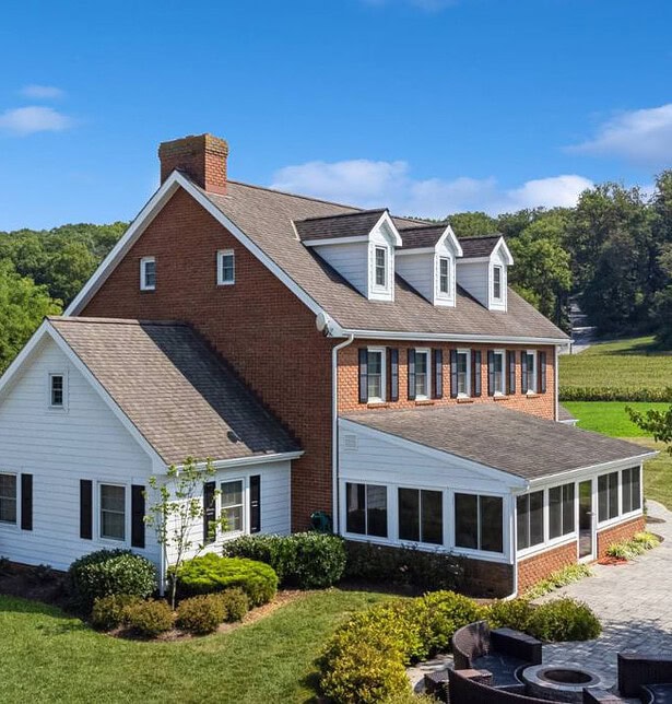 Modern home expansion of brick house 