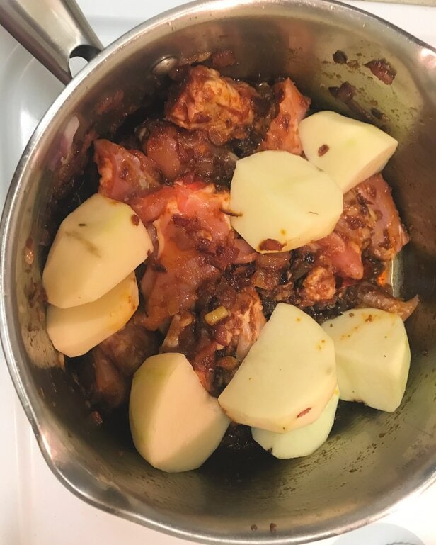 add potatoes to chicken curry