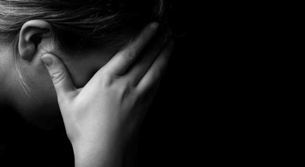 Fatigued girl hands on her face