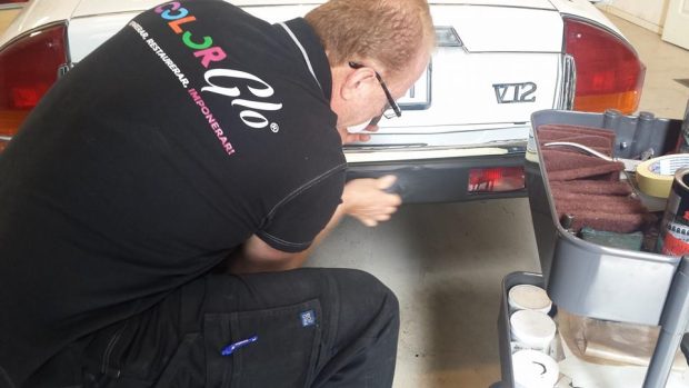 color glo restoration franchisee working on a fancy car