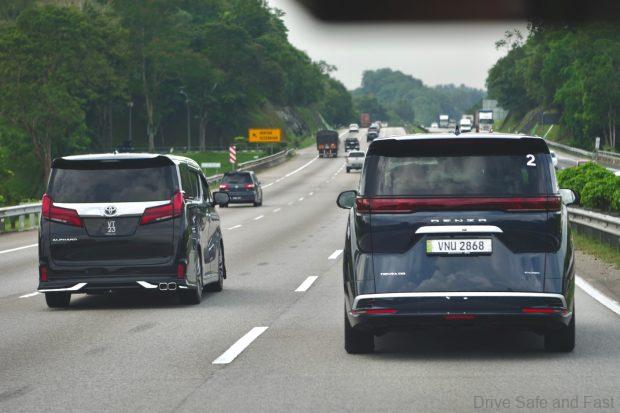 Denza D9 next to toyota alphard