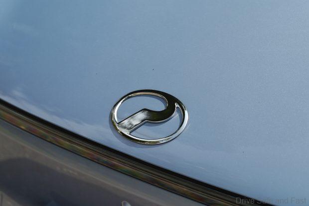 Perodua QV-E badge on hood