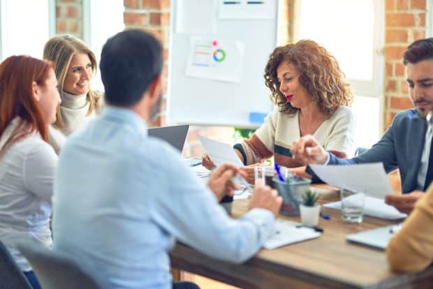 in-person meeting of a franchise leadership team