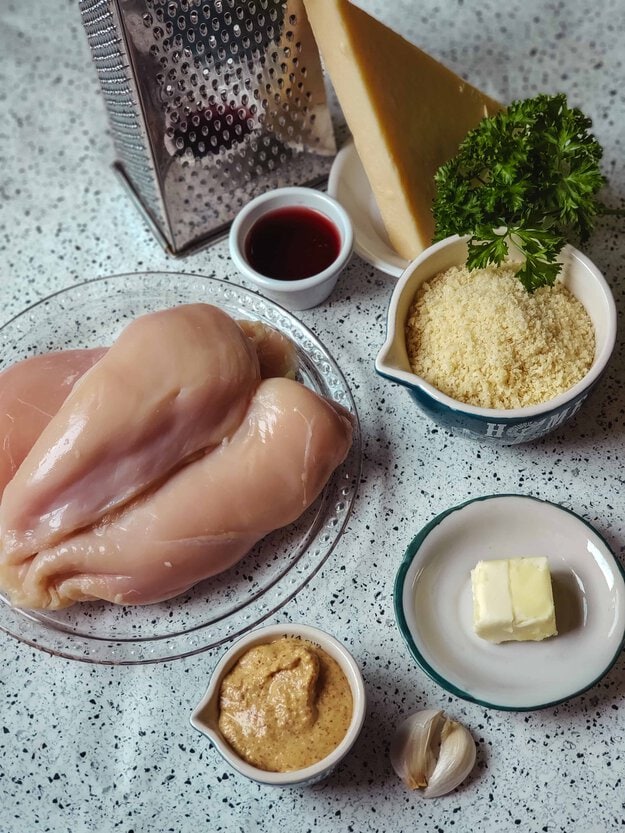 Tired of the same old chicken recipe for dinner? Mix things up with this easy and delicious Parmesan Dijon Chicken recipe for weeknight dinner.