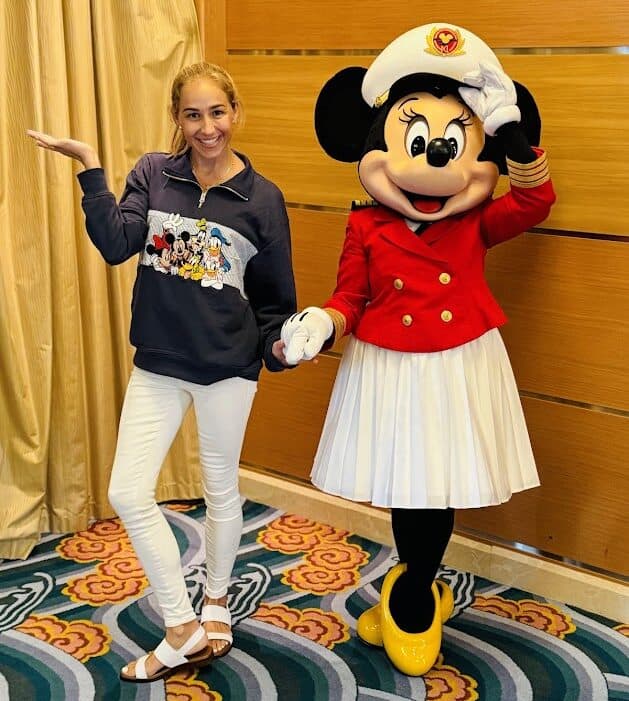 Disney vacation with Minnie Mouse character at 407 and Beyond Vacation Co.