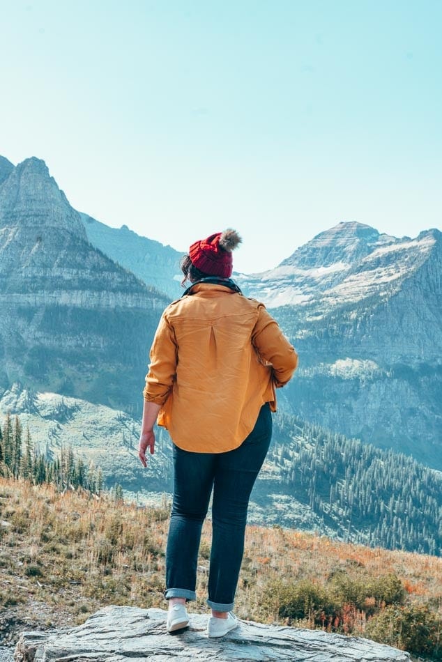 Exploring Glacier National Park in Allbirds white sneakers.