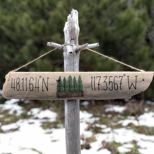 pine tree driftwood sign