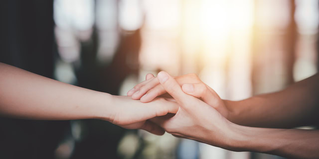 640 husband and wife join hands to cheer relationship care concept comforting family members mutual encouragement tenderness comfort and sympathy helping giving hope and believing