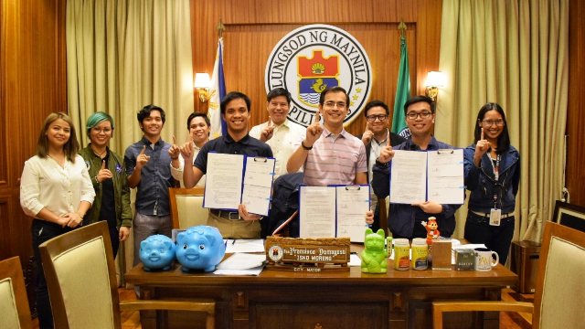 Senti AI Team and Google Philippines rep beside Manila City Mayor Isko Moreno and the Manila Public Information Office