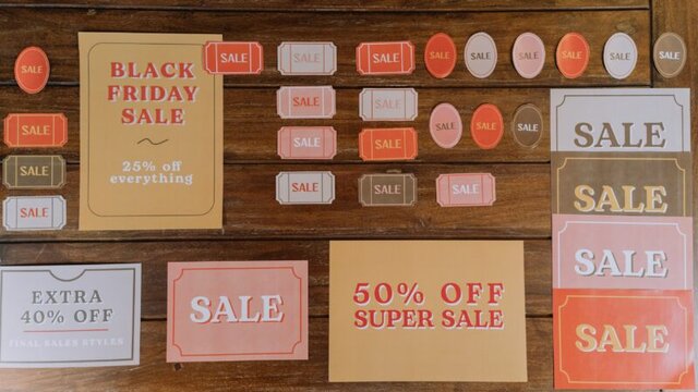 Sale signs for Black Friday discounts on gifts