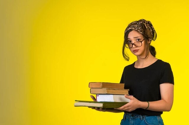 Designer reviewing a print-ready PDF with bleed lines, safe zones, and 300 DPI artwork prepared for professional printing