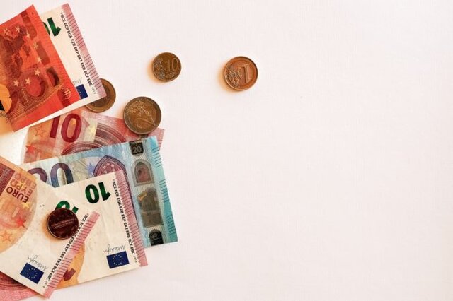 Cash representing cashback and savings apps