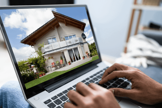man looking at housing online
