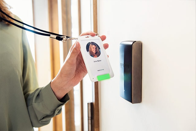 Swiping badgeholder on access door