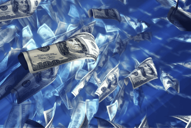one hundred dollar bills in liquid