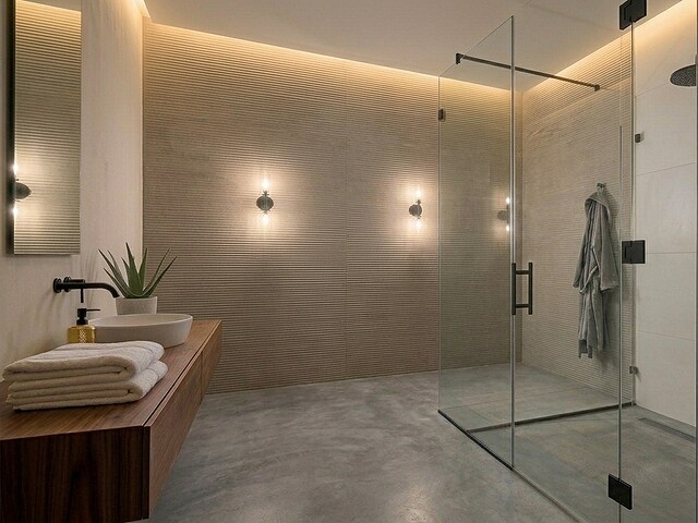 Frameless toughened glass shower enclosure in a Dubai bathroom