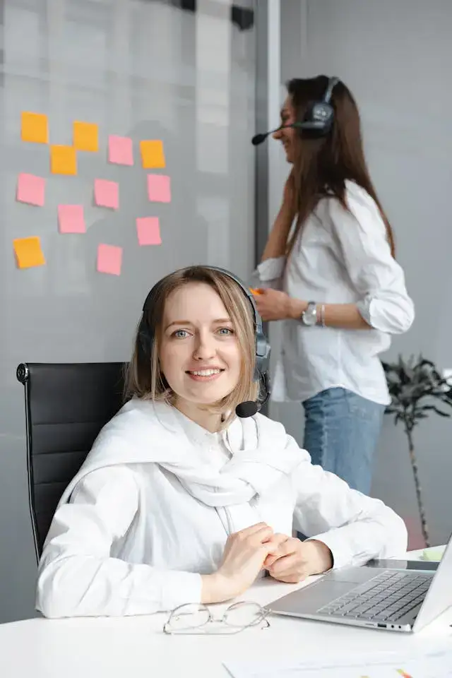 Woman in White Long Sleeve Shirt Working