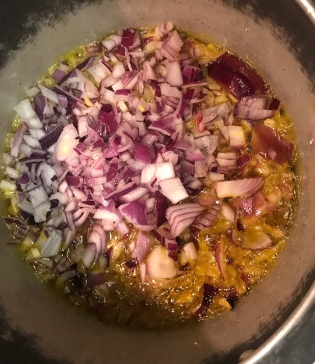 fry onions goat curry