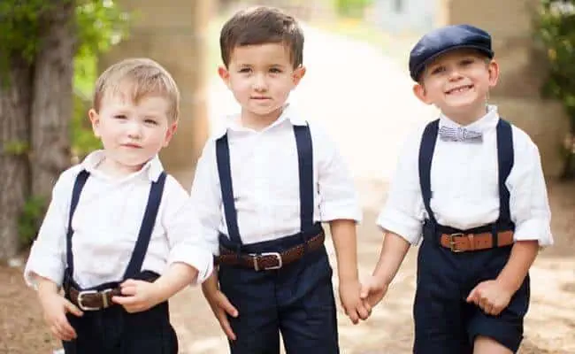 3 small boys in suits