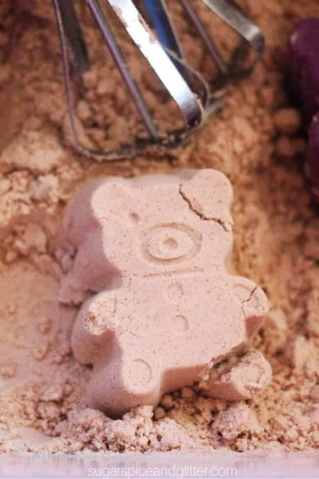 hot chocolate cloud dough recipe featuring a bear shape