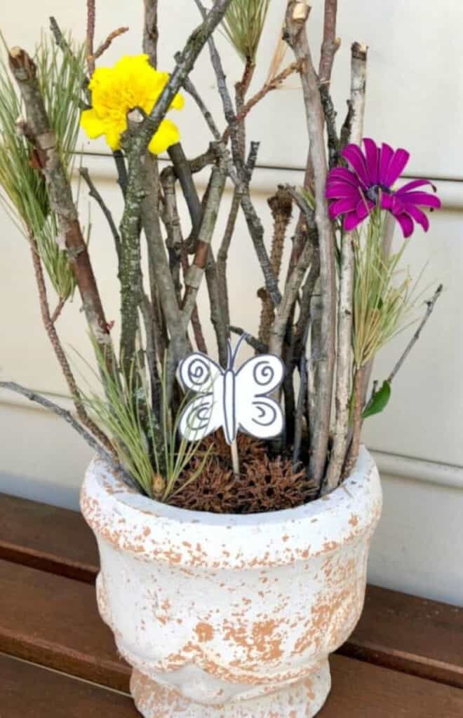 Craft outdoor idea featuring a small world play in nature