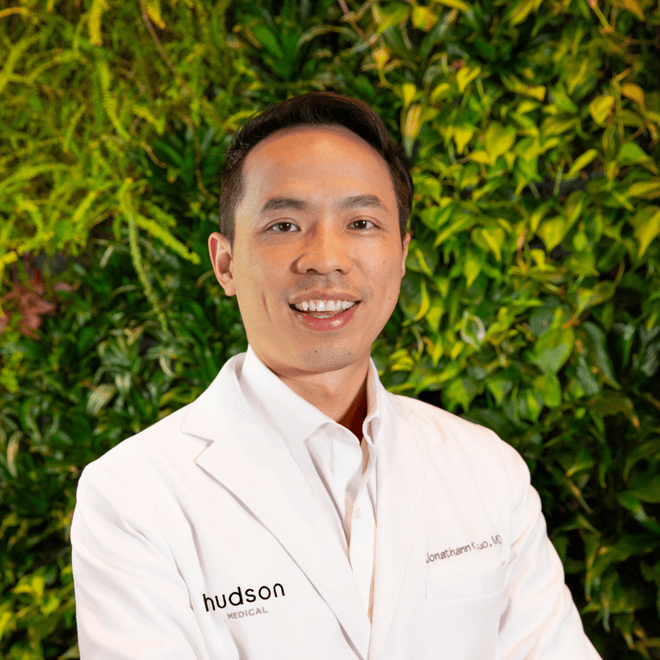 Dr. Jonathann Kuo portrait with green background
