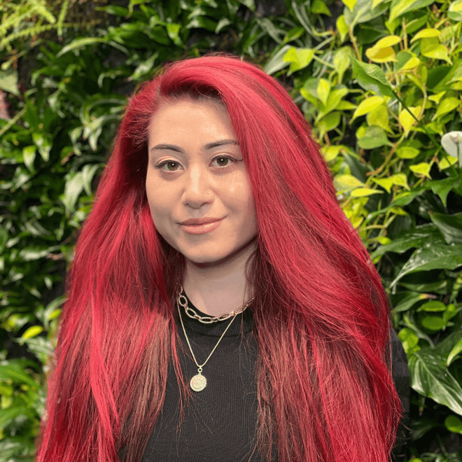 Tasha Ednie portrait with green background