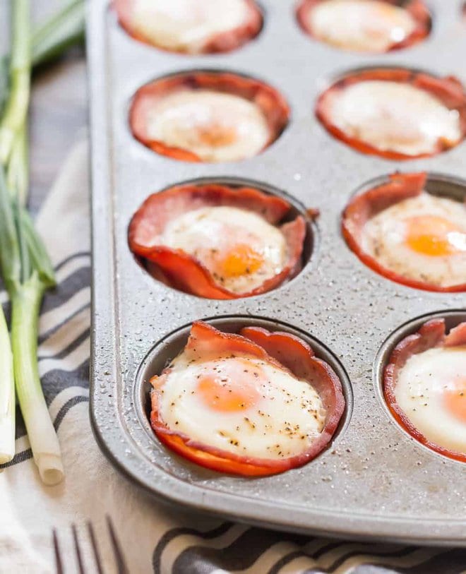 Cooked eggs in ham in a muffin pan