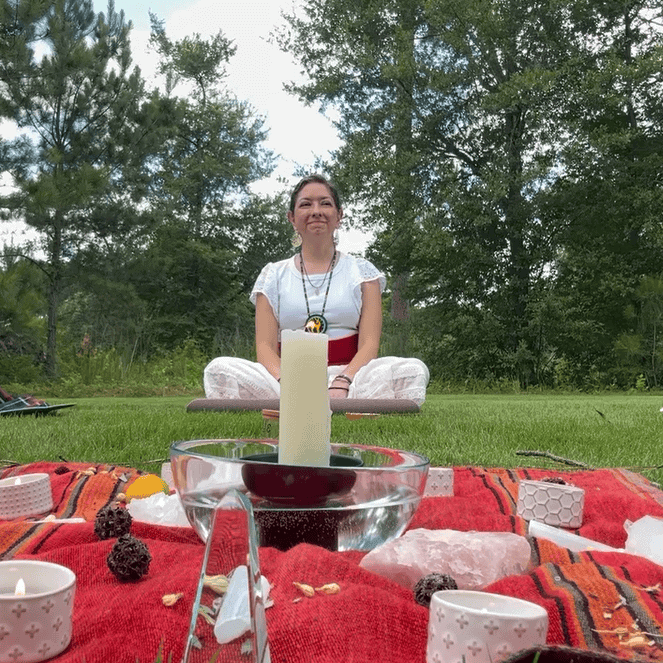 Calm meditation session outdoors at Soulstice Living with participants practicing mindfulness surrounded by nature.