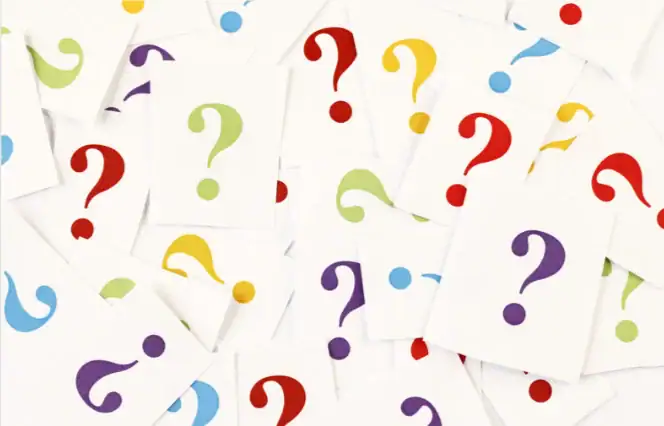 person holding a clipboard engages with diverse customers, symbolizing the essence of creating effective customer questionnaires