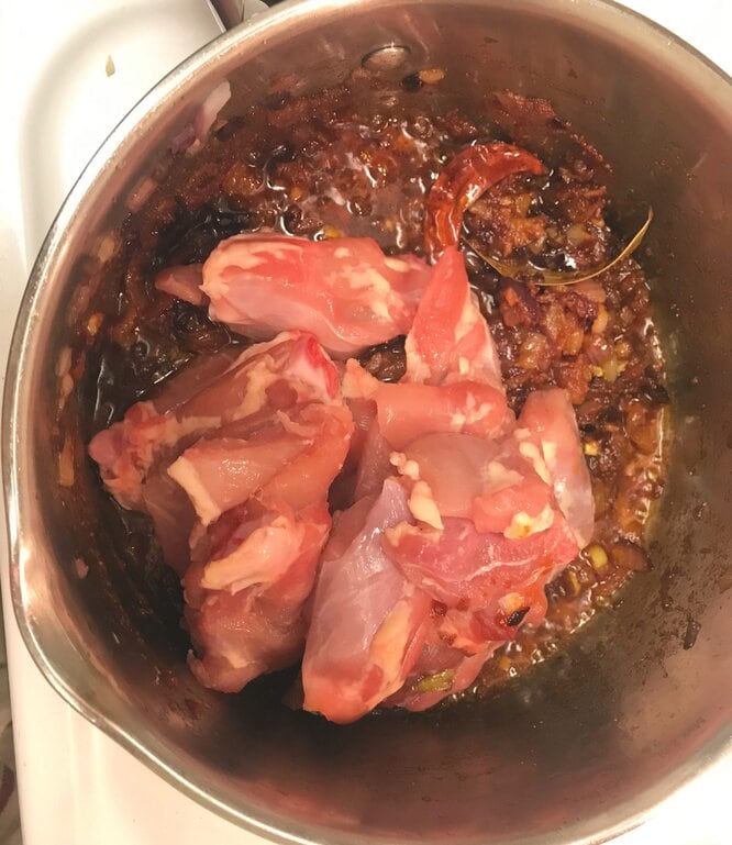 add chicken pieces to the chicken curry