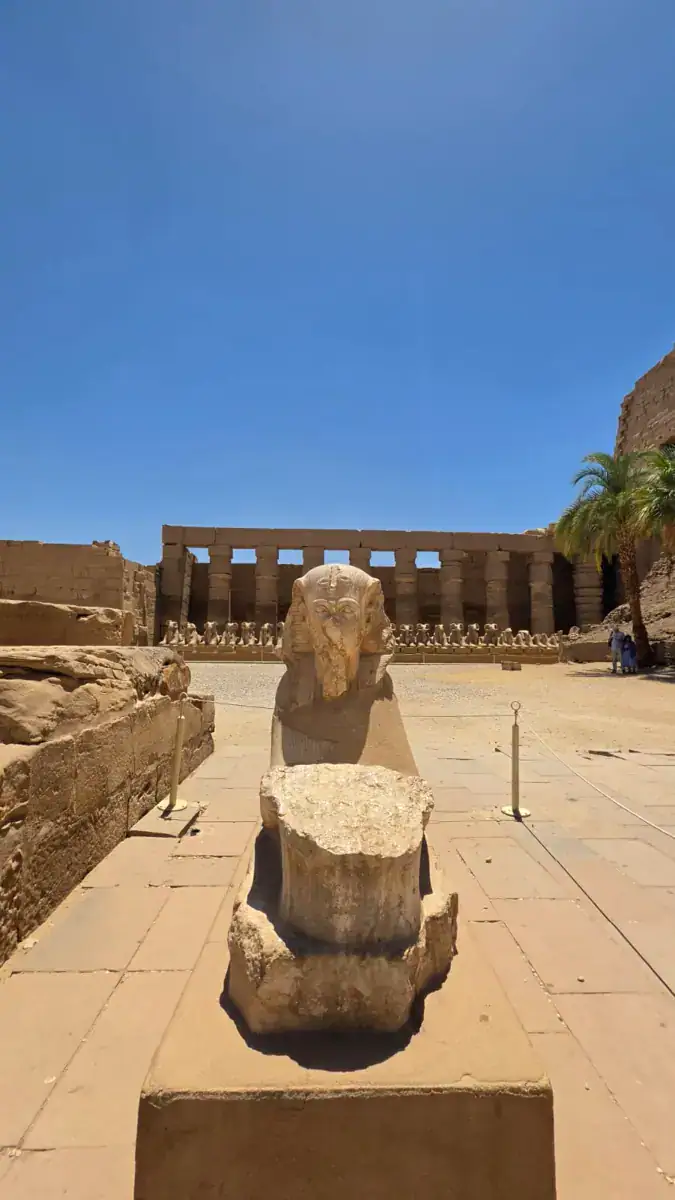 Sphinx court and royal head at Karnak Temple in Luxor