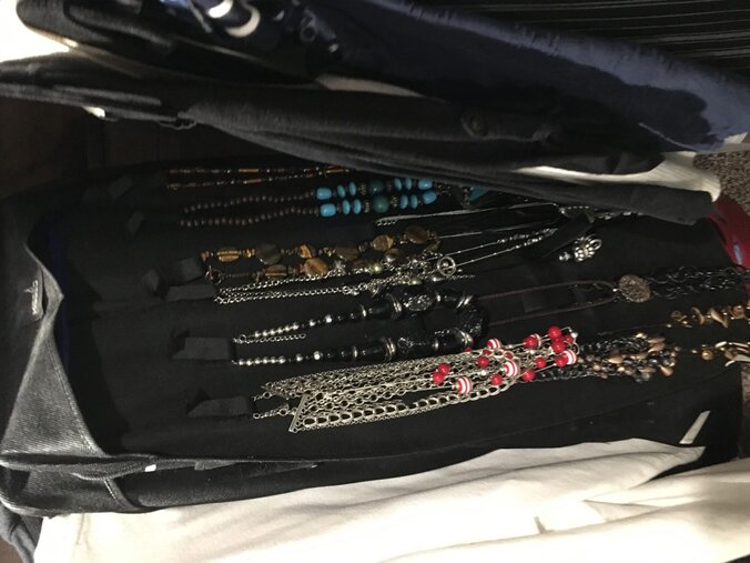 The other side is designed to hang necklaces. PERFECT!