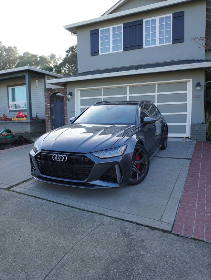 Gray Audi RS 6 wagon in a driveway after its detail