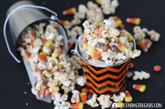 This Candy Corn Popcorn recipe is the perfect Halloween snack. | www.thefarmgirlgabs.com