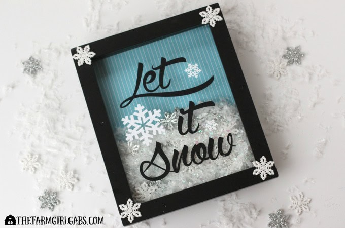 While the weather outside may be frightful, this Let It Snow Shadow Box craft is really delightful.