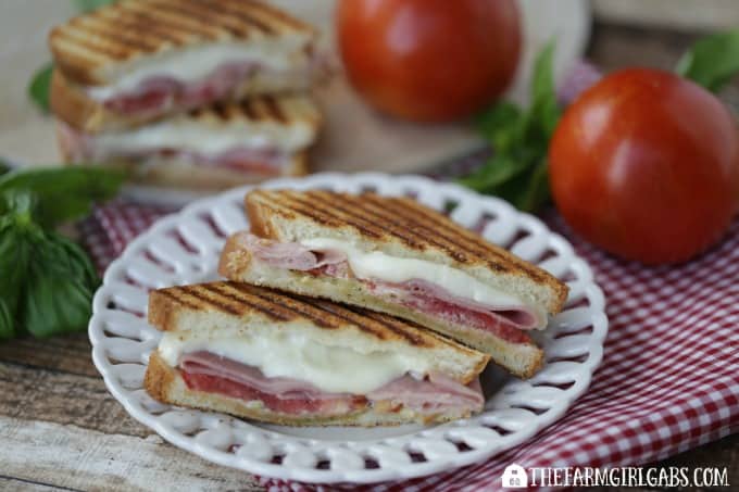 This Caprese Ham Panini scores big points! Tomatoes, mozzarella, ham and a basil spread are sandwiched between two slices of Pepperidge Farm bread and grilled to perfection. #SandwichWithTheBest www.thefarmgirlgabs.com