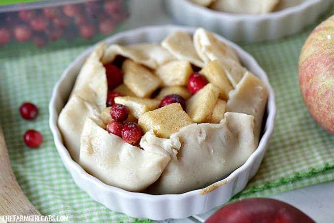 Sweet apples and tart cranberries collide to make these delicious Apple Cranberry Tarts. This is the perfect recipe for your fall celebration.