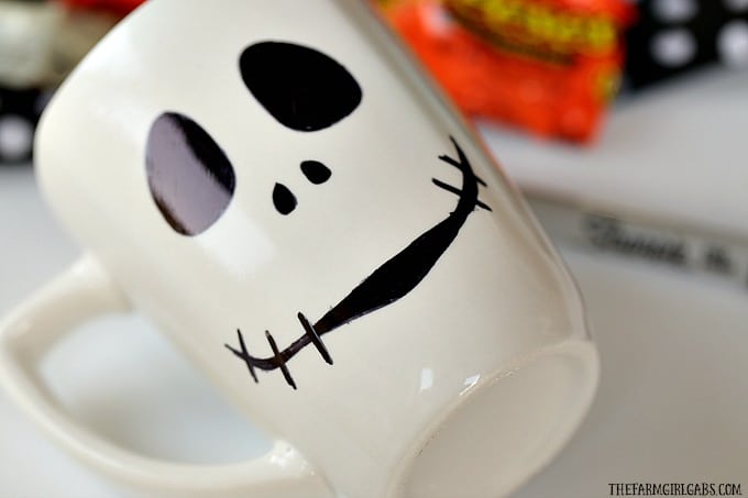 This DIY Jack Skellington Sharpie Mug is no tricks and all treats. This easy Nightmare Before Christmas craft makes a great party favor too!