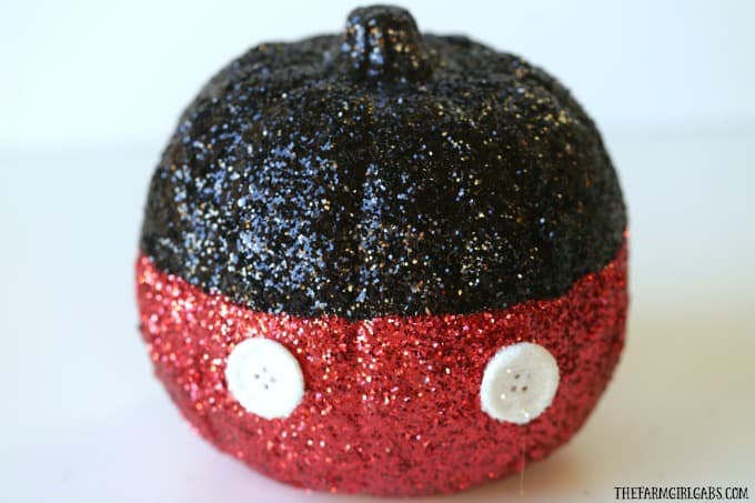 Oh boy! Make your Disney Halloween swell with this easy DIY Mickey Mouse Glitter Pumpkin.