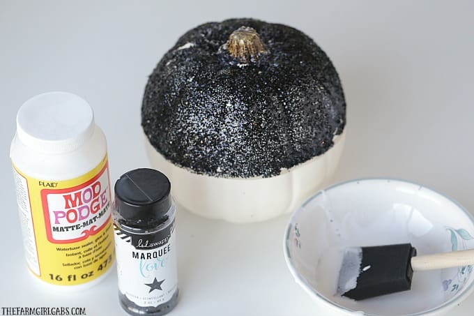 Oh boy! Make your Disney Halloween swell with this easy DIY Mickey Mouse Glitter Pumpkin.