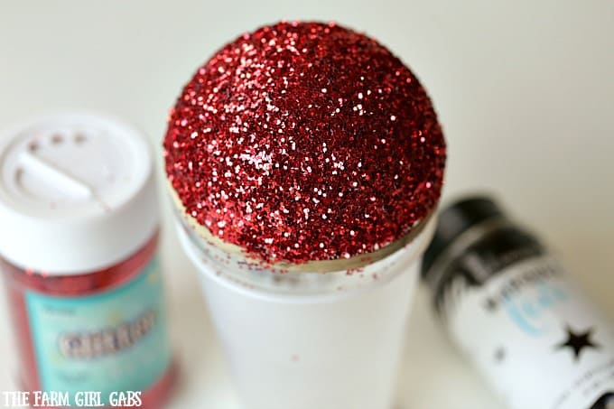 This Magical Mickey Mouse Glitter Ornament is the perfect DIY project for your Disney-inspired Christmas tree.