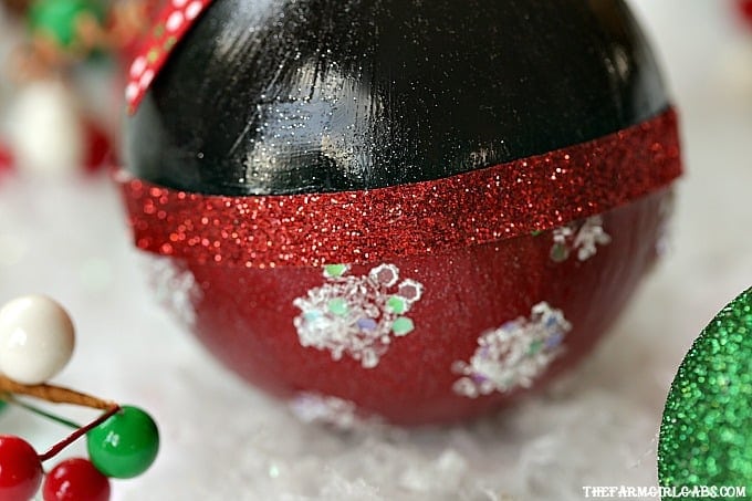 Make merry magical with this adorable Disney Minnie Mouse Glitter Ornament. It's an easy DIY craft for your Christmas tree.