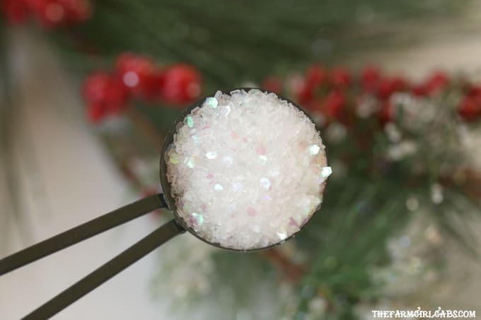 This easy DIY Snowy Lantern Ornament will shine brightly on your Christmas tree.