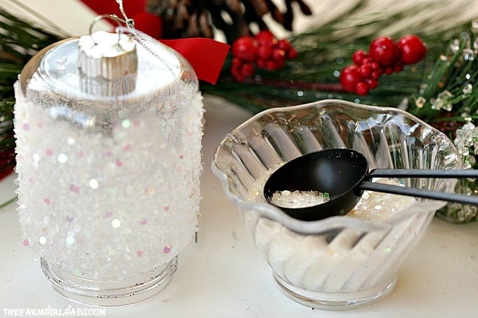 This easy DIY Snowy Lantern Ornament will shine brightly on your Christmas tree.