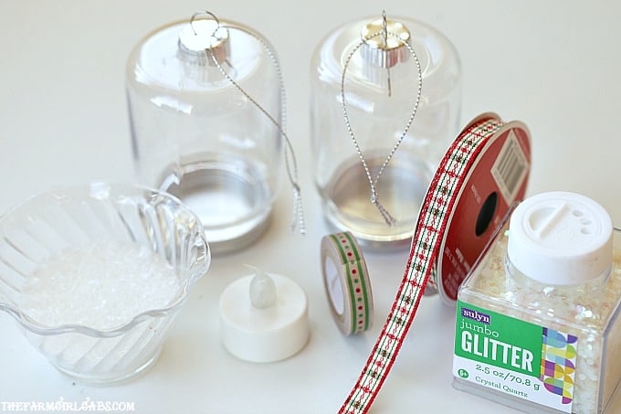 This easy DIY Snowy Lantern Ornament will shine brightly on your Christmas tree.